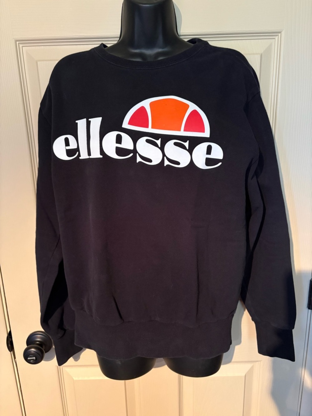 Ellesse Black Sweatshirt with White Logo and Orange Accent